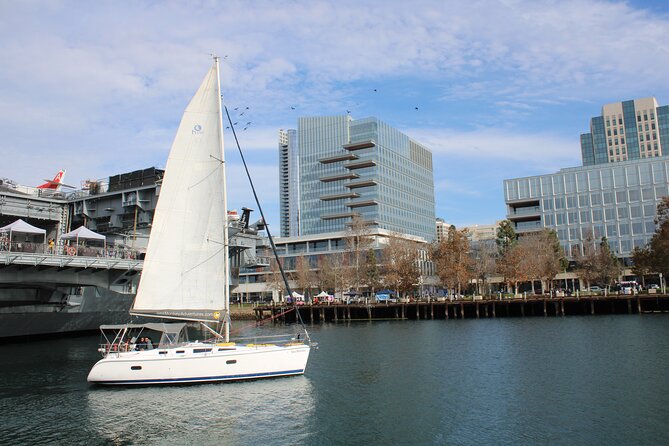 2.5 Hour Private Sunset Sailing Tour in San Diego up to 12 guests - The close pass by the US Midway and the Kissing statue