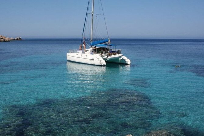 2-Catamaran tour from Cannigione to the Maddalena Archipelago - Stop 3: Razzoli and Santa Maria for cliffs, Cala S. Maria, and snorkel zones