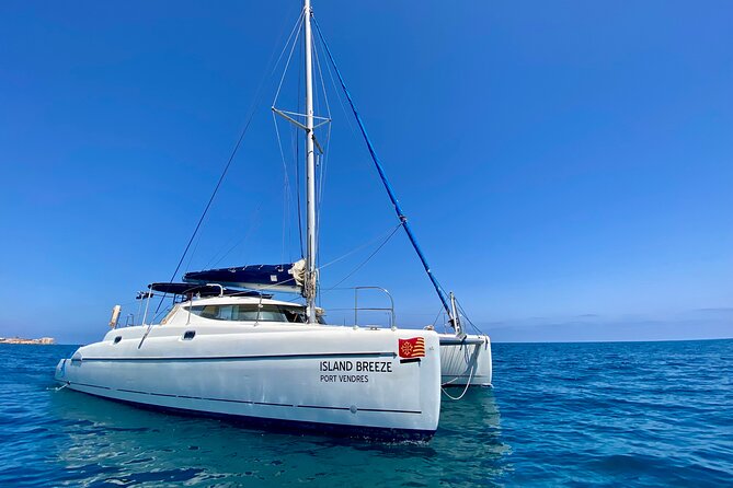 2 hour Catamaran Boat Tour - Snorkeling and calm-water SUP boarding under anchor