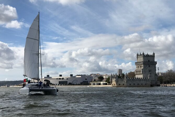 2H Tour on a Private Sailing Catamaran "Scarlett" up to 16 people - Why a Private Sailing Catamaran Makes Lisbon Click Faster