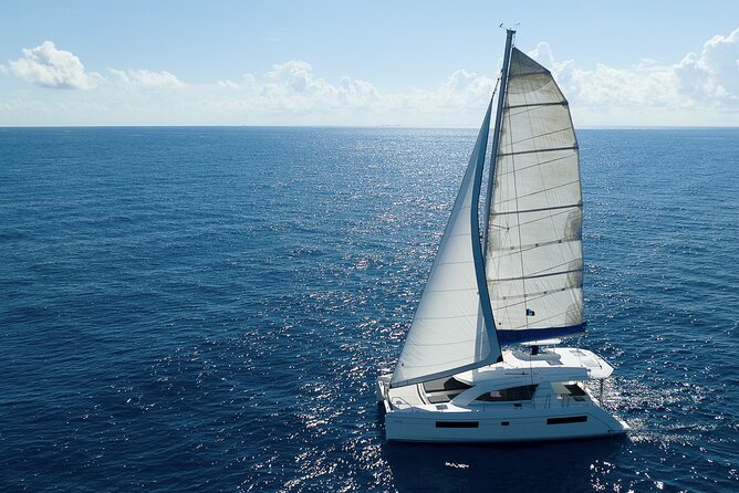 5-Hour 38'Luxury Catamaran All-Inclusive Tulum & Playa del Carmen - Riviera Maya’s In-Ha reef stop: calm snorkeling and sea turtles