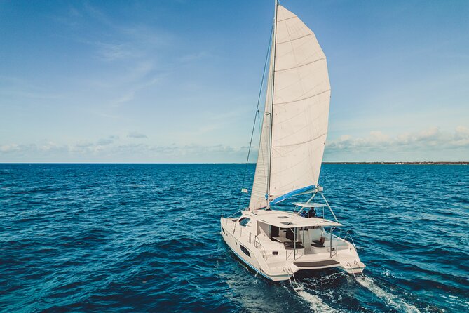 5H Private 44' Catamaran All-Inclusive - Tulum & Playa del Carmen - La Bocana party stop: shallow swim time, music, and ceviche