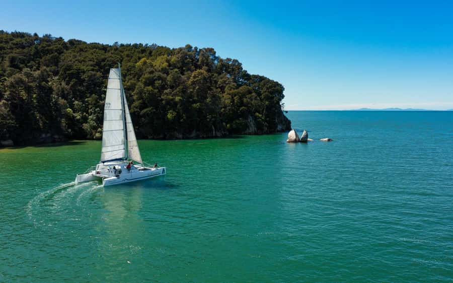 Abel Tasman National Park: Sailing and Self-Guided Walk - Packing smart: windbreaker, shoes, and what people forget