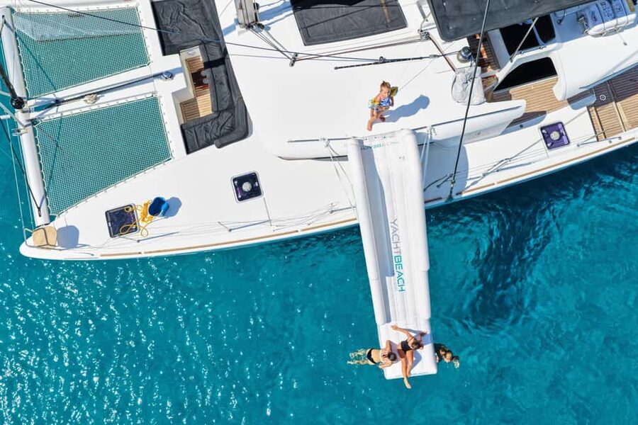 Agios Nikolaos All-inclusive Catamaran Cruise & Water Toys - Stepping onto a modern catamaran that’s built for a full day