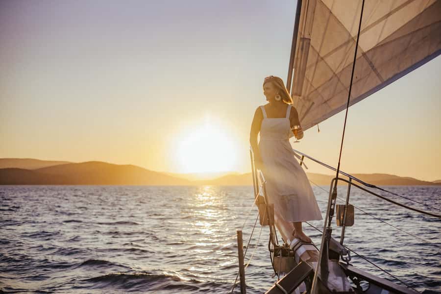 Airlie: Adults Only Sunset Sail with Aperol Spritz/Antipasto - Getting aboard the Lady Enid: barefoot sailing on timber decks
