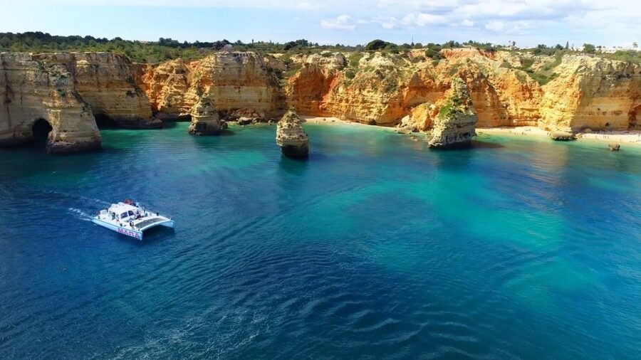 Albufeira: Catamaran Cruise with BBQ & Open Bar on the Beach - From Albufeira Marina to the Benagil Coast: The Catamaran Start