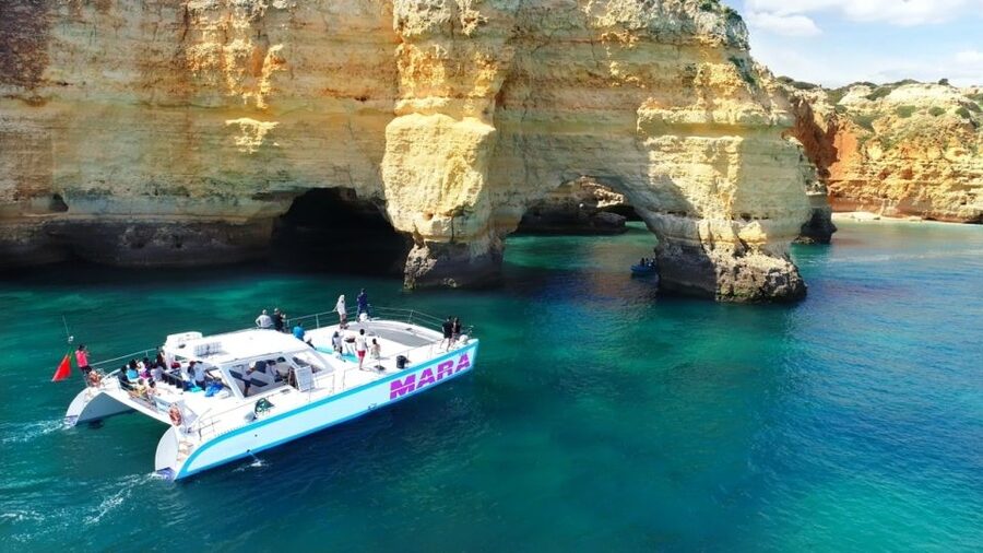 Albufeira: Catamaran Cruise with BBQ & Open Bar on the Beach - Up-Close Cave Time: How the Dinghy Transfer Actually Works