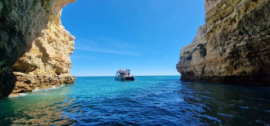 Albufeira: Coastline and Benagil Caves Tour by Catamaran - Onboard Experience: Comfort, Music, and the Crew Energy