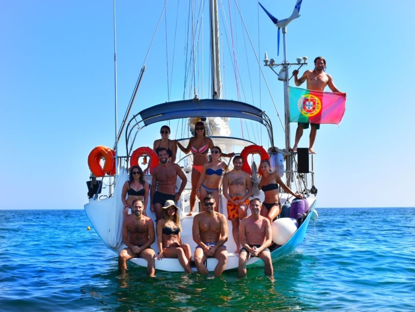 Albufeira: Sailing Boat Cruise BBQ & Open Bar on the Beach - Why this cruise works: Benagil caves seen from the angles that matter