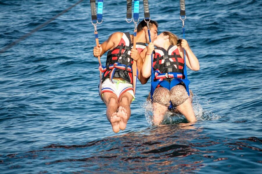 Albufeira: Single, Double or Triple Parasailing Tour - Descent and the water-touch moment: plan for a splash, not a spectacle