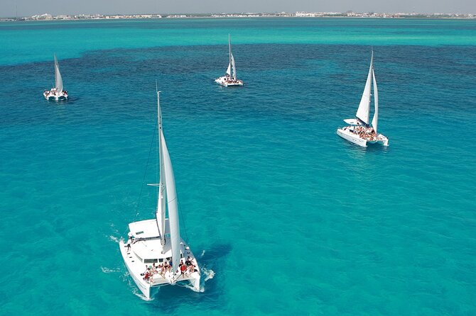 All-Inclusive Isla Mujeres Catamaran with Free Transportation - Oceanix departure at Playa Tortugas: the easy start