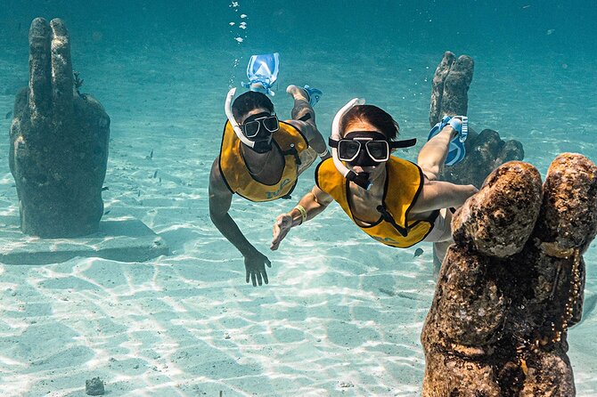 All-Inclusive Isla Mujeres Catamaran with Free Transportation - Blanquizal sandbar swim: the unique Caribbean “shoe-off” moment