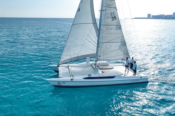 All-Inclusive Isla Mujeres Catamaran with Free Transportation - Express check-in, welcome mimosa, and crew-led boarding