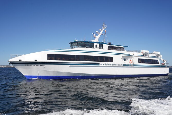 Aran Islands and Cliffs of Moher Day Cruise sailing from Galway City Docks - Cliffs of Moher from the water: sea stacks, caves, and scale