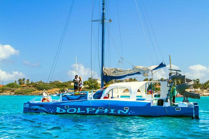 Aruba Sunset Sail Cruise Aboard The Dolphin Catamaran - Where You Meet at Delphi Watersports Aruba (Noord) and How Boarding Works