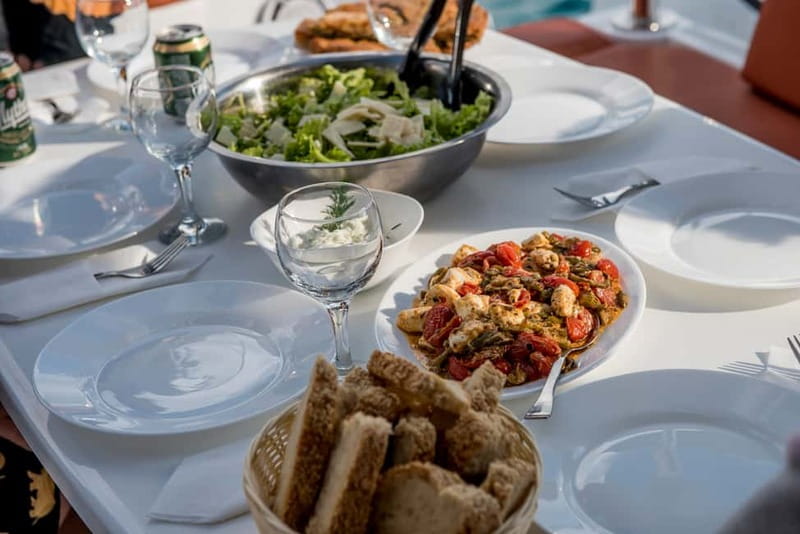 Athens: Half-Day Morning Catamaran Cruise with Meal & Drinks - Vouliagmeni Bay: Snorkeling Plus Greek Appetizers