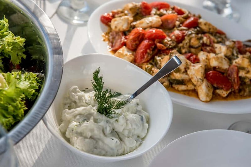 Athens: Half-Day Sunset Catamaran Cruise with Meal & Drinks - Swimming and Snorkeling Stops in the Saronic Gulf
