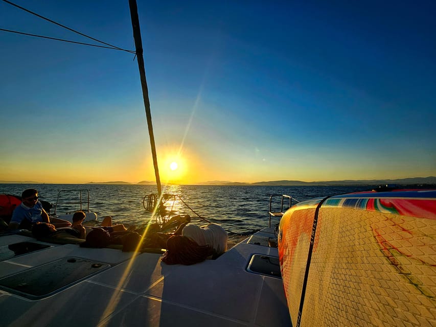 Athens: Riviera Catamaran Tour with Fresh Meal and Drinks - Vouliagmeni and Asteras Bay: the calm-water swim stop