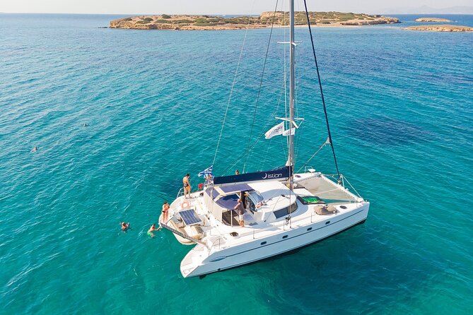 Athens Semi Private Sunset Catamaran Cruise with meal & drinks - How Vouliagmeni Beach Works as Your First Water Break
