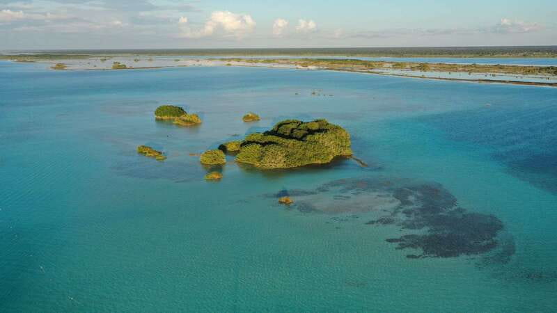 Bacalar: Group Sailing Trip with Swimming and Drinks - Drinks and fruit: what’s included and why it helps