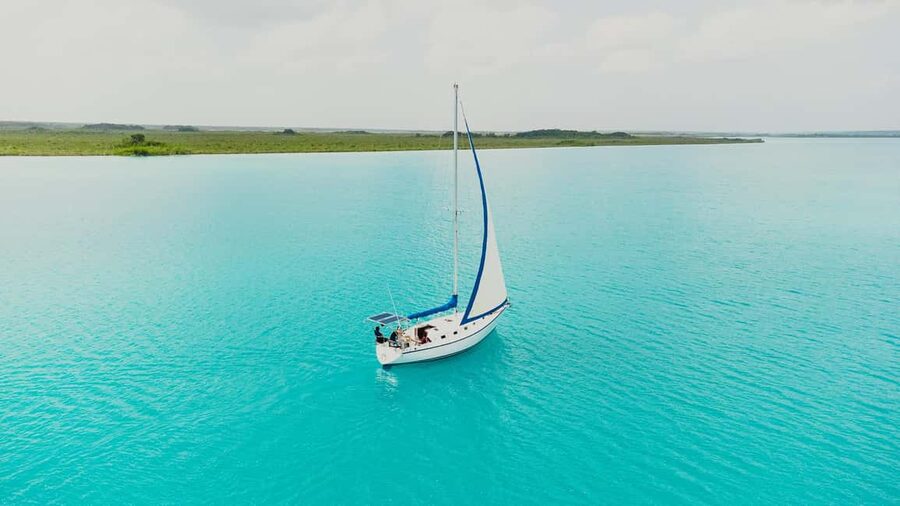 Bacalar Lagoon Sailing Tour with Open Bar and Mexican Lunch - Mexican Lunch, Snacks, and That Fruit-Focused Break