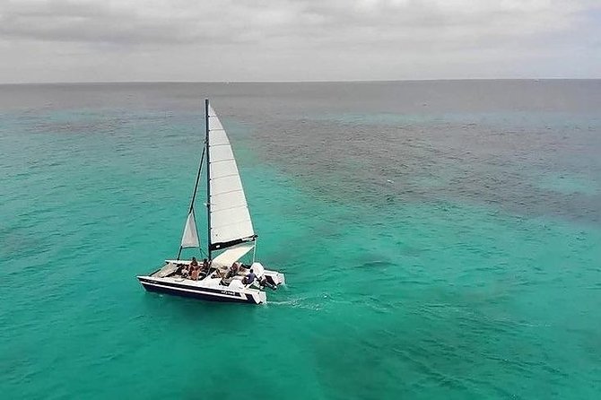 Barbados Catamaran Snorkel Cruise with Lunch and Open Bar - Deck life, rum punch, and the open bar rhythm