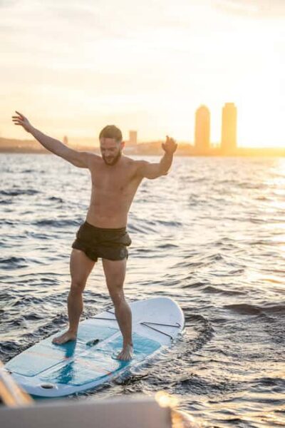 Barcelona Badalona : Sailboat Tour, Snacks, Drinks, Swimming - Aperitif on the water: snacks, drinks, and that slow-moving skyline