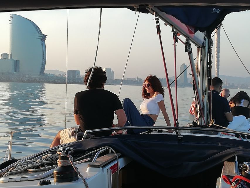 Barcelona: Luxury Private Sunset Yacht Cruise - Sunset over the Barcelona skyline: W Hotel, Barceloneta, Olympic Towers