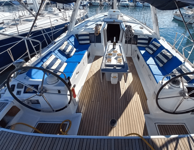 Barcelona: Luxury Private Yacht Daytime Cruise - Onboard Comfort: Cava or White Wine, Snacks, Blankets, Music, and a Real Speaker