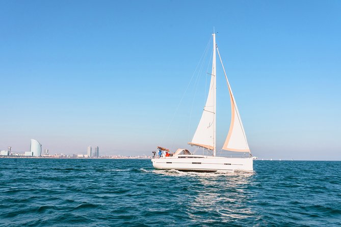 Barcelona Sailing: Light Snacks & Open Bar with Private Option - The Mediterranean swim break: go if the sea says yes