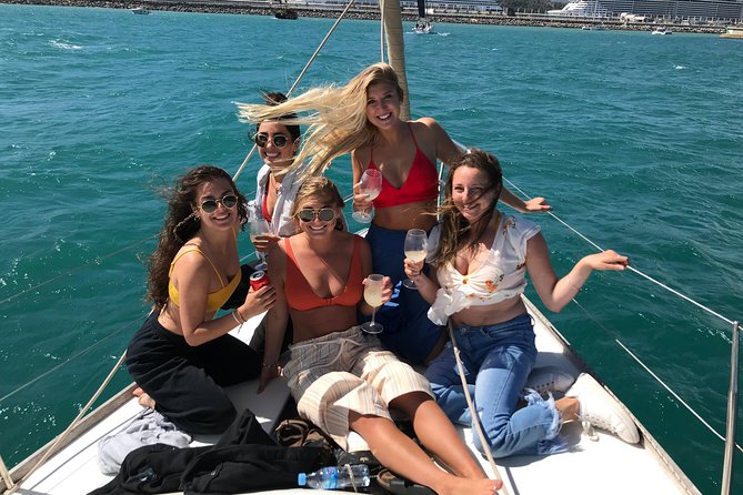 Barcelona Sailing: Light Snacks & Open Bar with Private Option - Cruising the landmarks: Columbus Monument, Maremagnum, and the harbor perspective