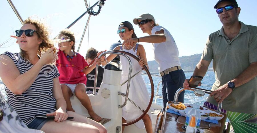 Barcelona: Sailing Tour with Spanish Tapas and Drinks - The Mediterranean swim stop: best when conditions cooperate