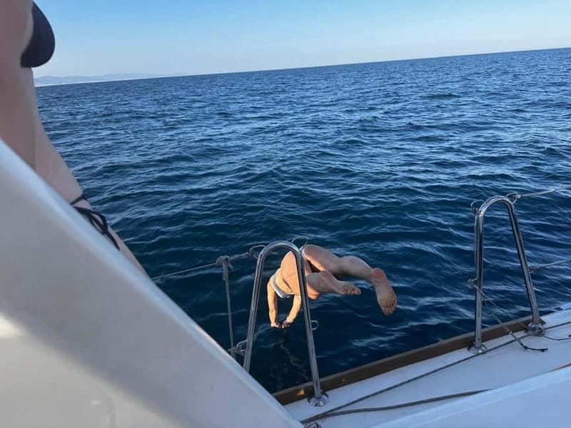 Barcelona: Sailing Tour with Tapas, Drinks and Swim Stop - Steering the Yacht vs. Kicking Back: Choose Your Level of Fun