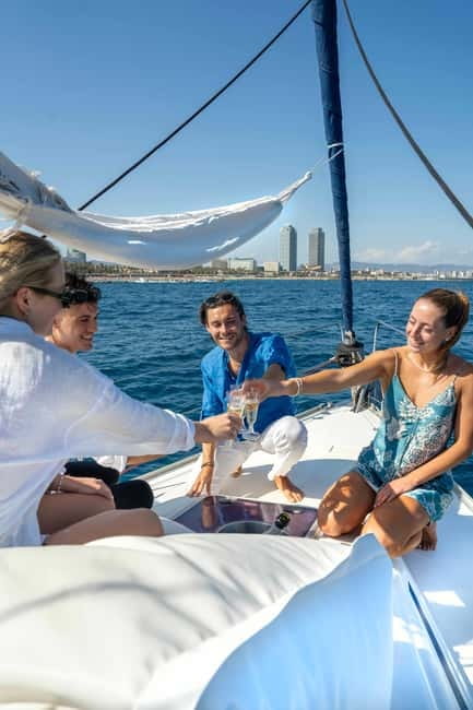 Barcelona: Sailing Tour with Young Local Captain & Drinks - Port Vell and Maremagnum: the harbor side of Barcelona