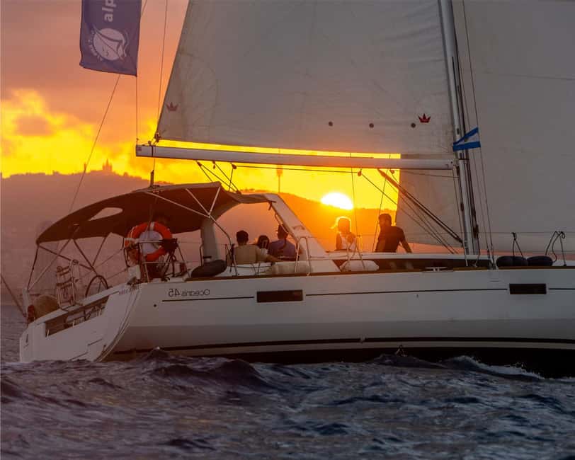 Barcelona: Sailing with Open Bar, Catalan Snack & Swim Stop - How the Time of Day Changes Your Views (Morning, Afternoon, Sunset)
