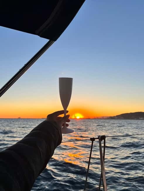 Barcelona: Sunset Sailboat Cruise with Open Bar and Snacks - Key highlights at a glance