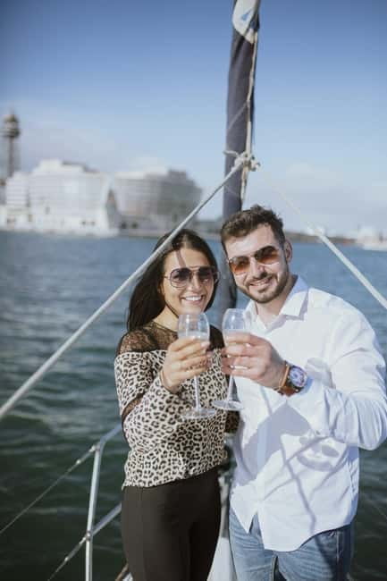 Barcelona: Sunset Sailboat Cruise with Open Bar and Snacks - Entering Barcelona by water: Olympic Port to your sunset sail