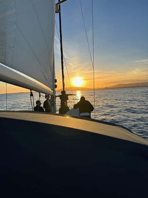 Barcelona: Sunset Sailboat Cruise with Open Bar and Snacks - Timing and weather: how to plan for the sky you get