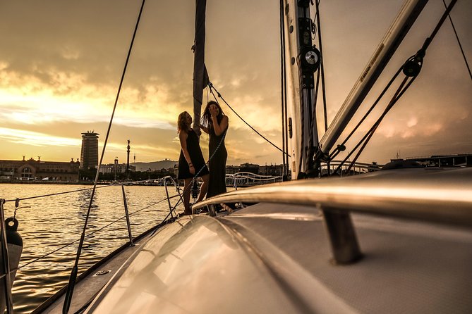 Barcelona Unique Sunset Sailing Experience with Tapas & Open Bar - Drinks and the Sunset Social Mood