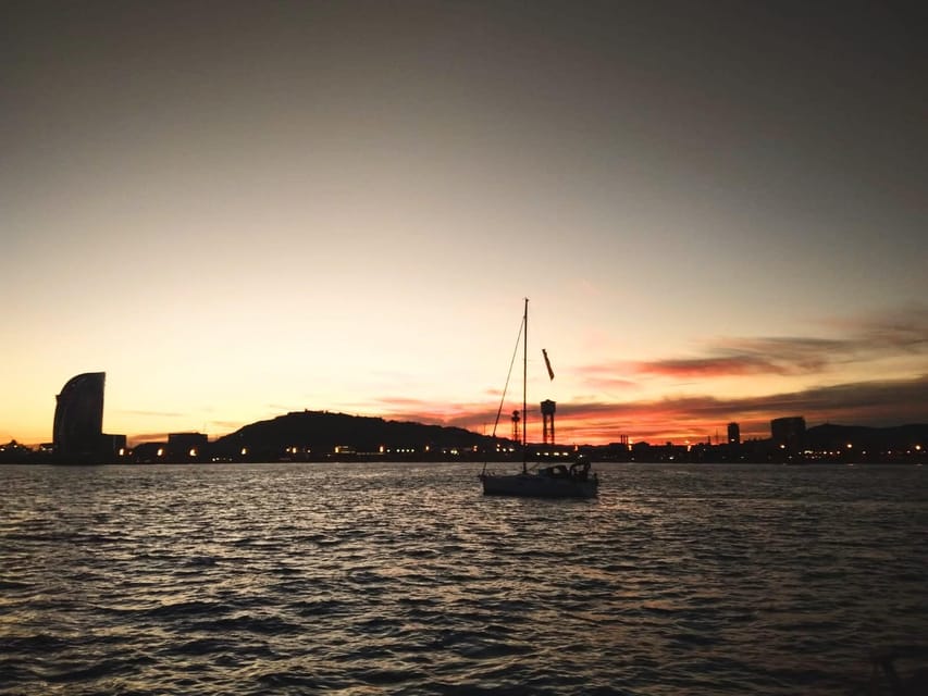 Barcelona: Unique Sunset Sailing Tour with Tapas & Open Bar - Steering the boat vs. relaxing: the fun factor that changes the mood
