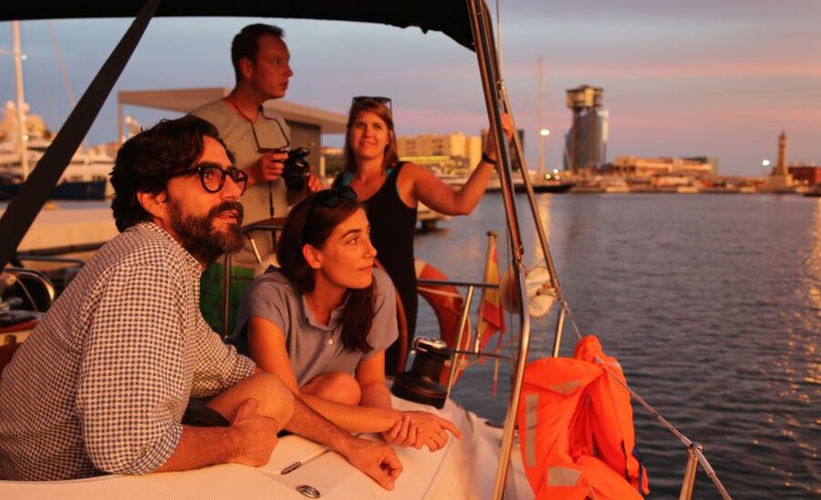 Barcelona: Unique Sunset Sailing Tour with Tapas & Open Bar - The skyline pass: Sagrada Família, W Hotel, Montjuïc, and beaches in twilight