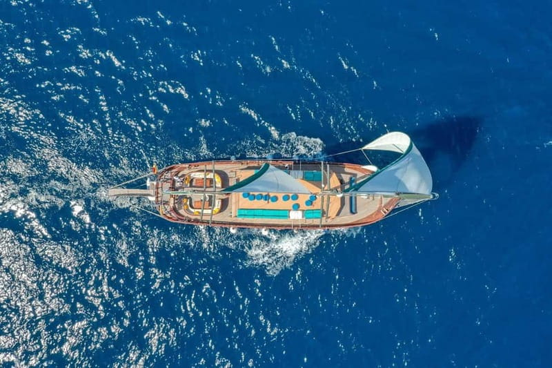 Barcelona: Wooden Boat Sailing with Tapa and Welcome Drink - Finding City Sailing Barcelona and Getting On Board
