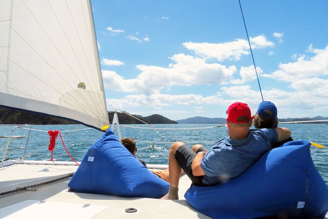 Bay of Islands: Day Sailing Cruise with Island Stop and Lunch - The island stop: two hours to swim, snorkel, paddle-board, and walk