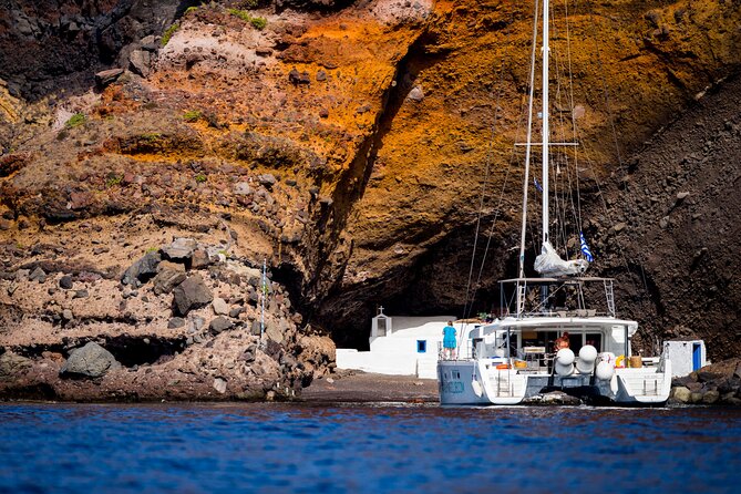 Beautiful Day Catamaran Caldera Cruise incl. Meal & Drinks - Stop 2 Continued: Volcanic Red Beach for Snorkeling and a Real Caldera Moment