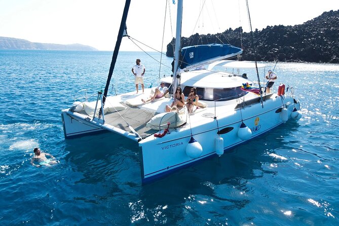 Best of Santorini Private Half-Day Catamaran Cruise with transfer and meal - Red Beach: volcanic color, Akrotiri nearby, and where to snorkel