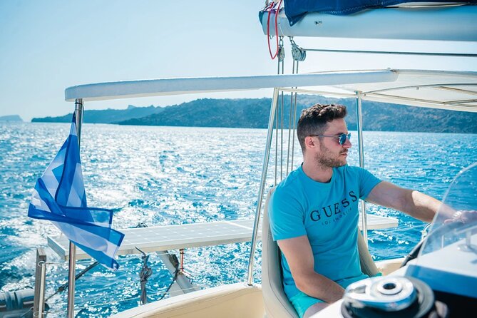 Best of Santorini Private Half-Day Catamaran Cruise with transfer and meal - Hot springs islands: Palea Kameni to Nea Kameni