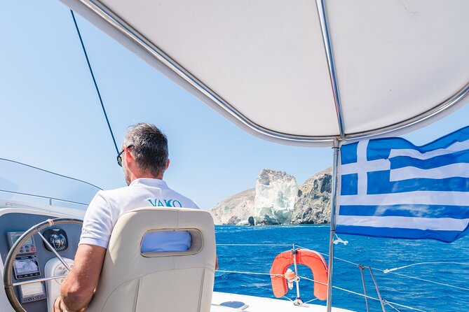 Best of Santorini Private Half-Day Catamaran Cruise with transfer and meal - On-board lunch or dinner with caldera views