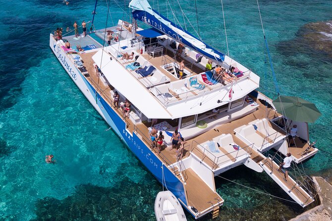 Blue Lagoon, Beaches and Bays Catamaran Sailing Tour - Ghajn Tuffieha Bay: sandy break and lazy-net time