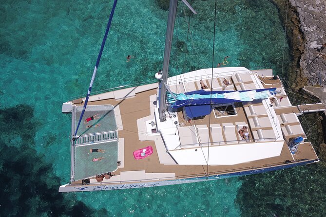 Blue Lagoon, Beaches and Bays Catamaran Sailing Tour - Crystal Lagoon: deeper water, caves, and a different kind of swim