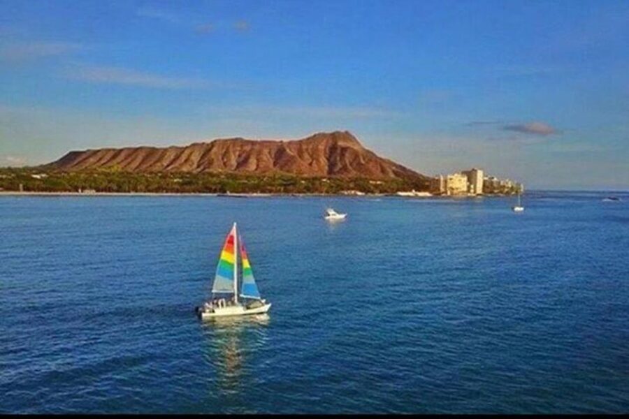 Board from Waikiki Beach: Scenic Sunset Sail on the Hāwea - Onboard music and the bar: included drinks, fast service, and optional Premium